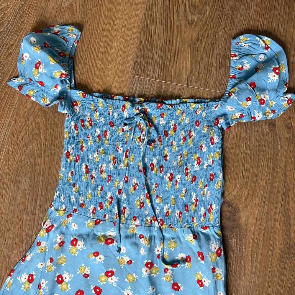 Faithfull the brand floral smocked midi dress